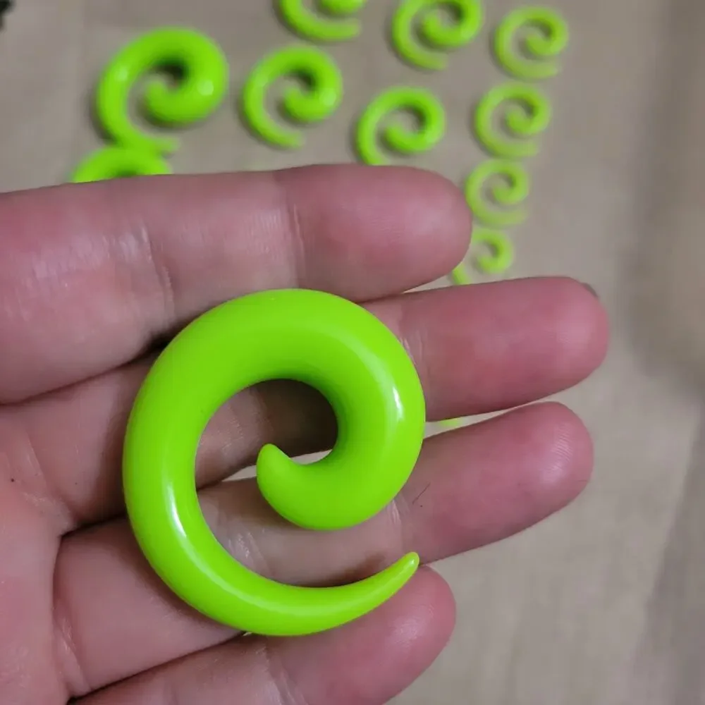 9 pairs of 14 - 00 gauge neon green acrylic spiral earrings